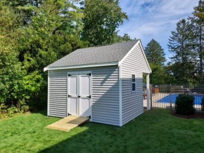 #42 (10' x 14' Vinyl Custom Pool House Shed With 6' Front Overhang)